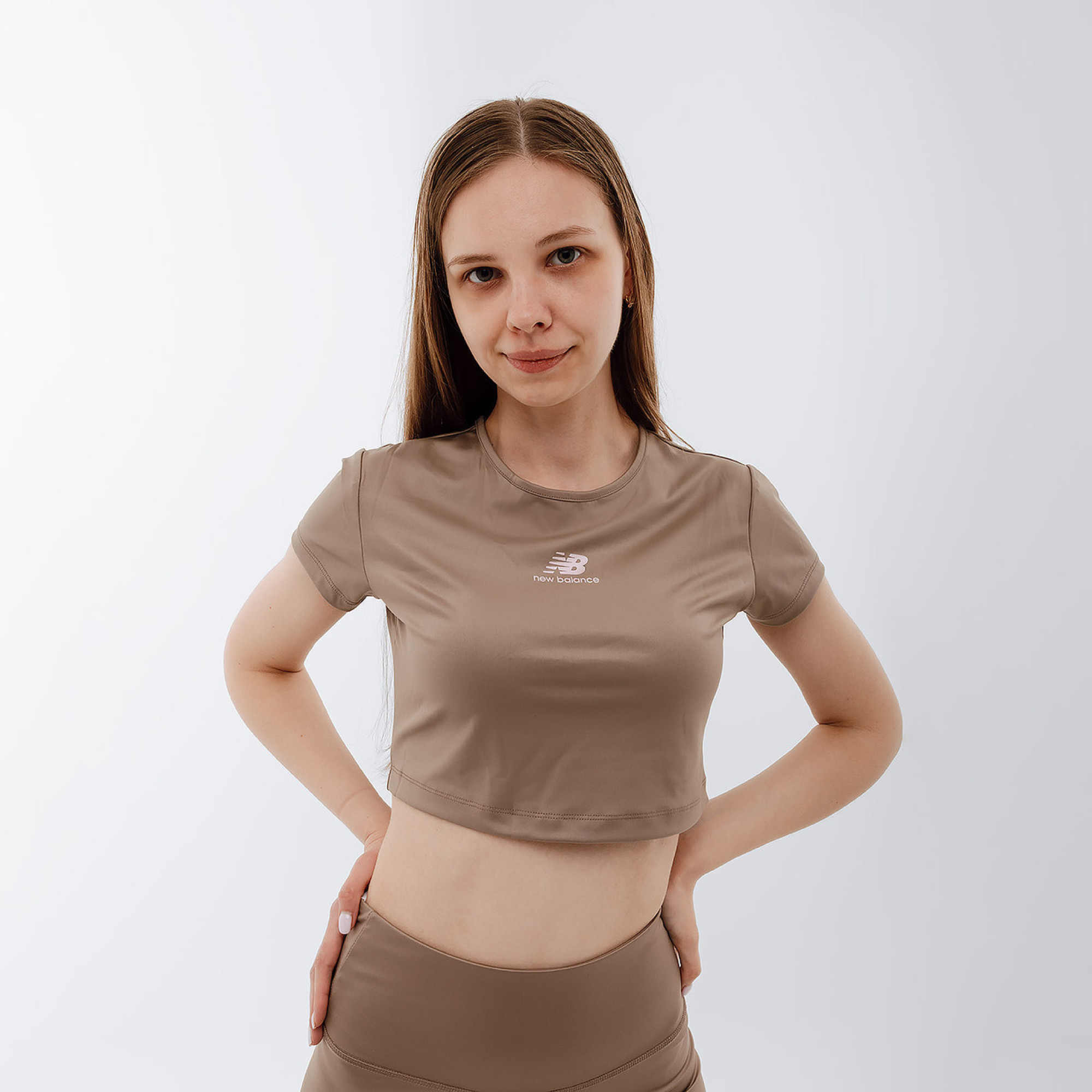 Жіноча Футболка New Balance Athletics Pearl Коричневий S (WT31556MS) - Robinzon.ua