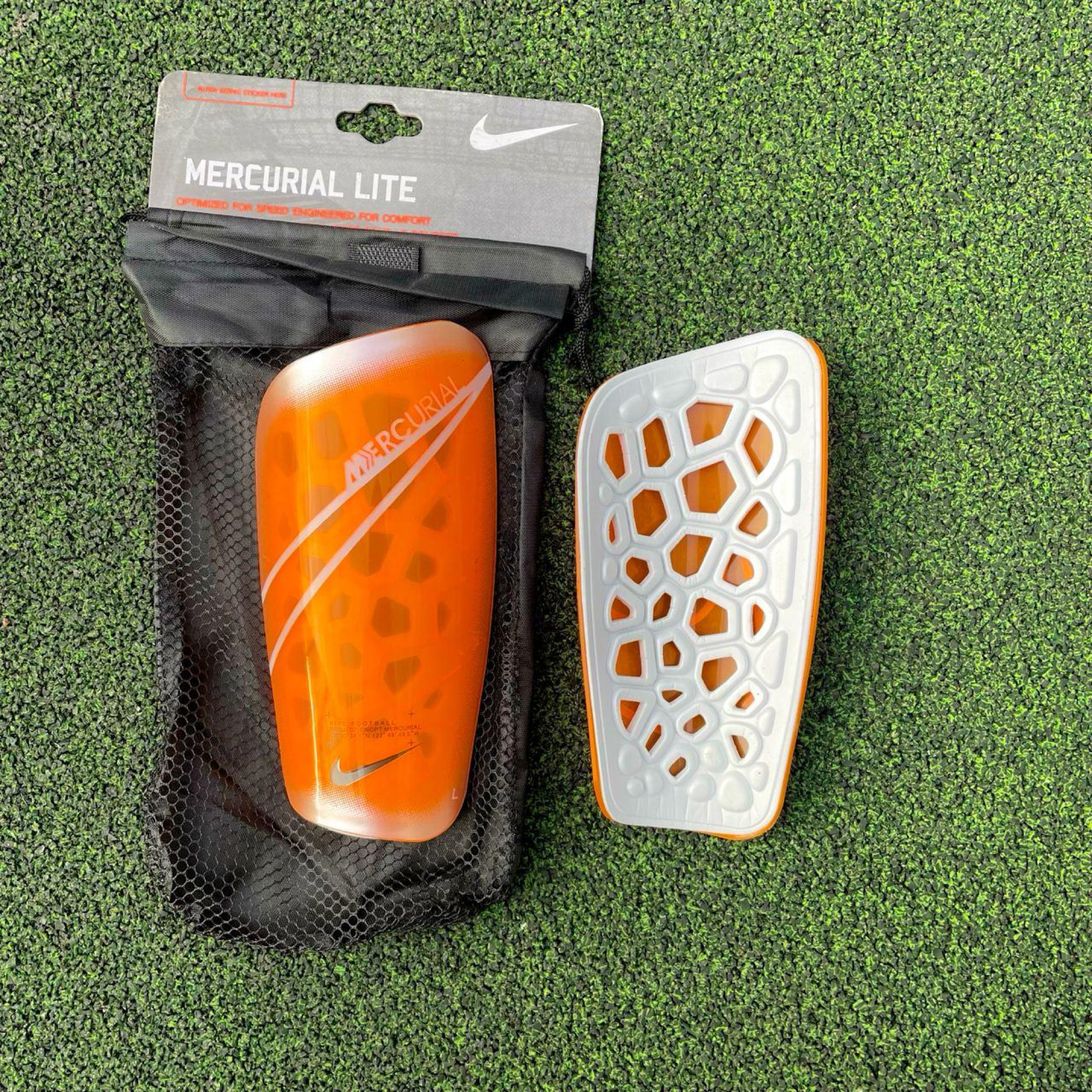 Футбольні щитки Nike Mercurial Lite Футбольні щитки Nike Mercurial Lite - Robinzon.ua