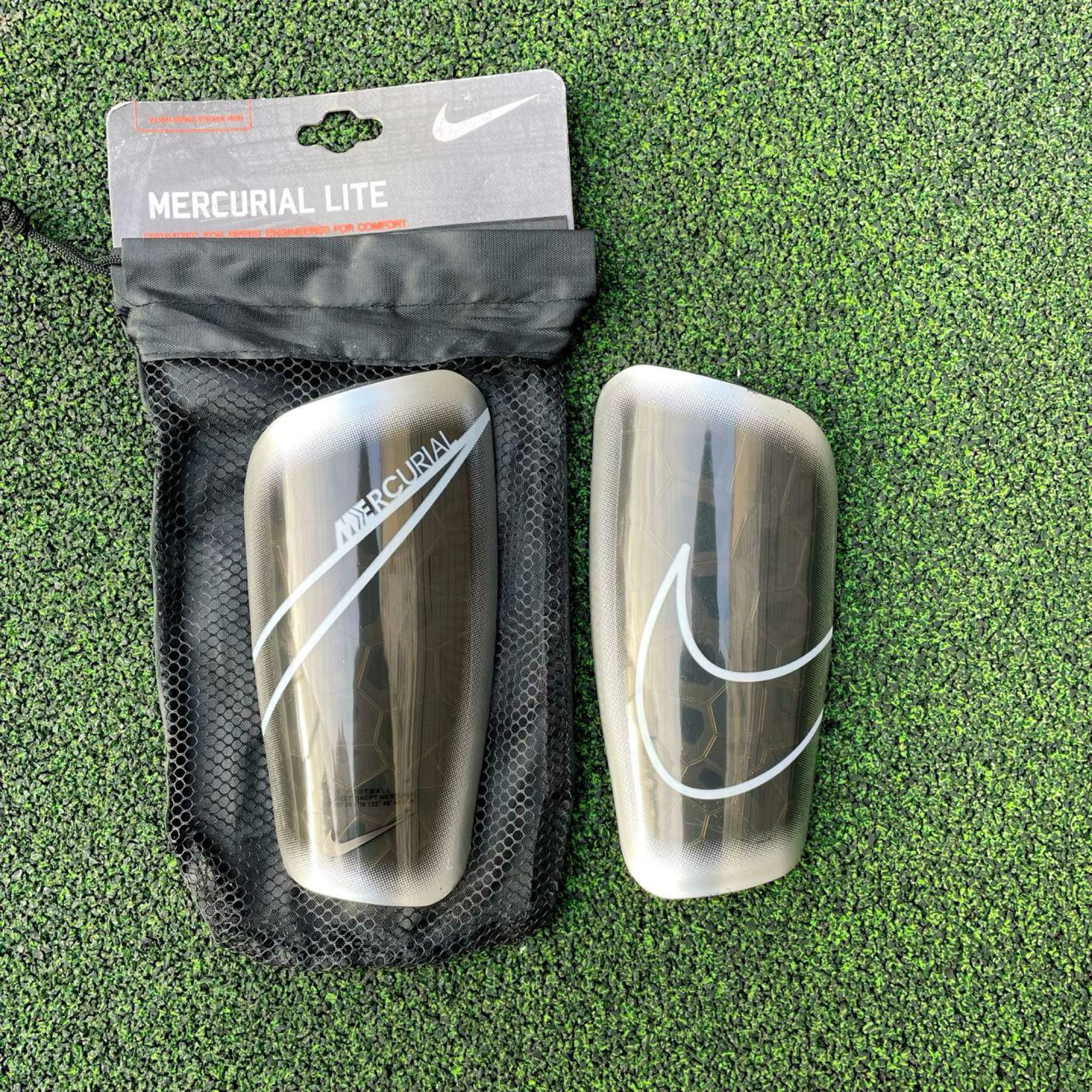 Футбольні щитки Nike Mercurial Lite Футбольні щитки Nike Mercurial Lite - Robinzon.ua